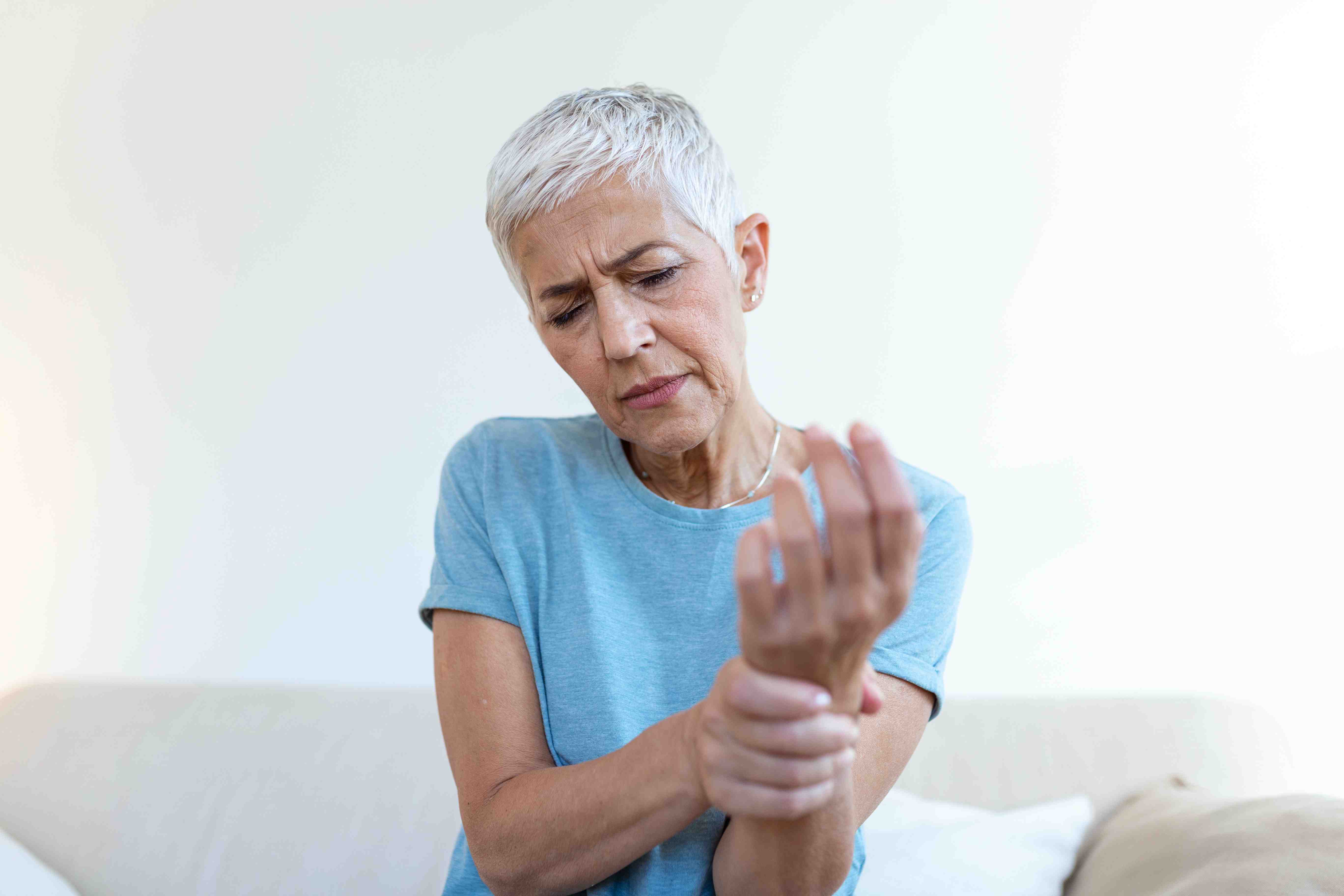 elderly-woman-suffering-from-pain-hand-arthritis-old-person-senior-woman-female-suffering-from-pain-home-compressed