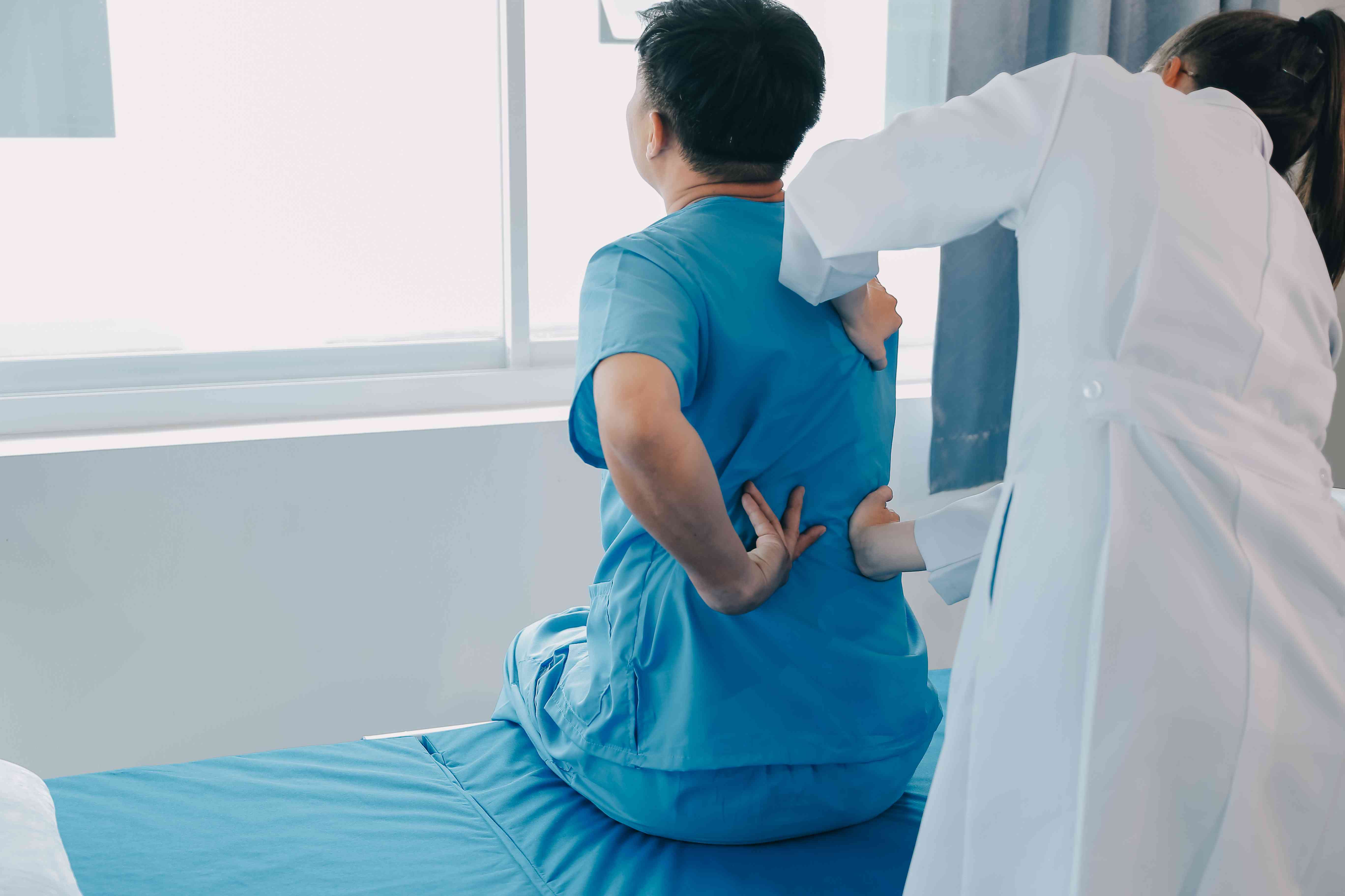 patient-doing-some-special-exercises-supervision-room-compressed